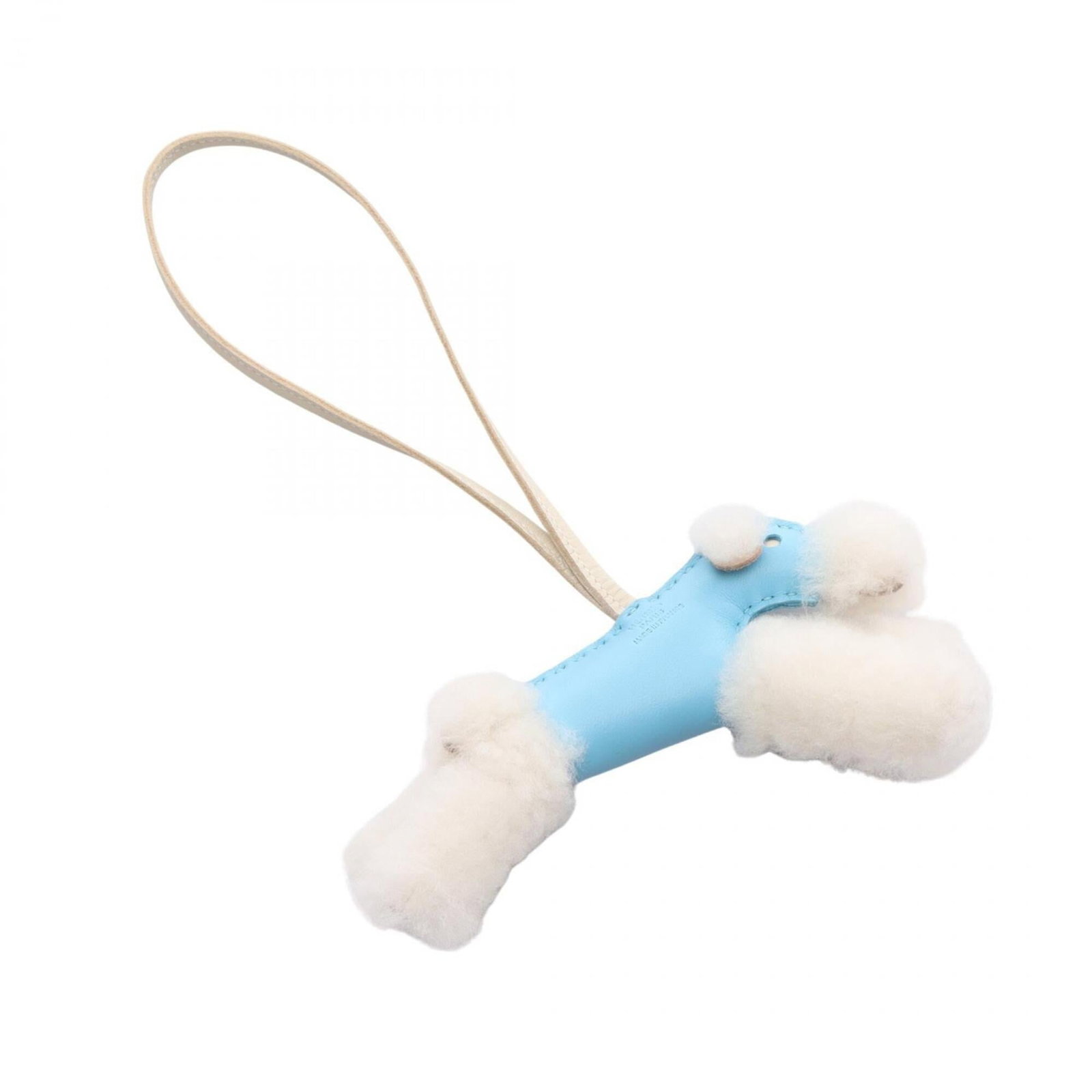 Hermes Handbag Charm Agneau Milo Leather: Hermes Handbag Charm Agneau Milo Leather Agneau Milo Leather Handbag Charm from Hermes - A stylish and luxurious accessory featuring Bleu Azteque, Blue, and White hues. Made from high-quality Agneau M