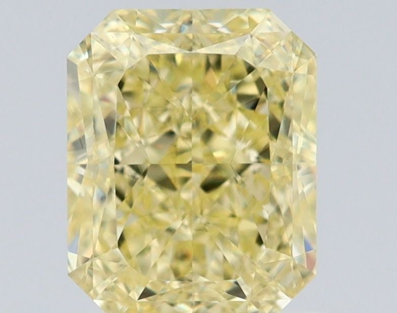 GIA Radiant 1.02ct Fancy Yellow VVS1 - Loose Natural Diamond: GIA Radiant 1.02ct Fancy Yellow VVS1 - Loose Natural Diamond GIA-certified, the 1.02ct Fancy Yellow VVS1 diamond boasts exceptional clarity and color, with EX polish and VG symmetry. This loose natura