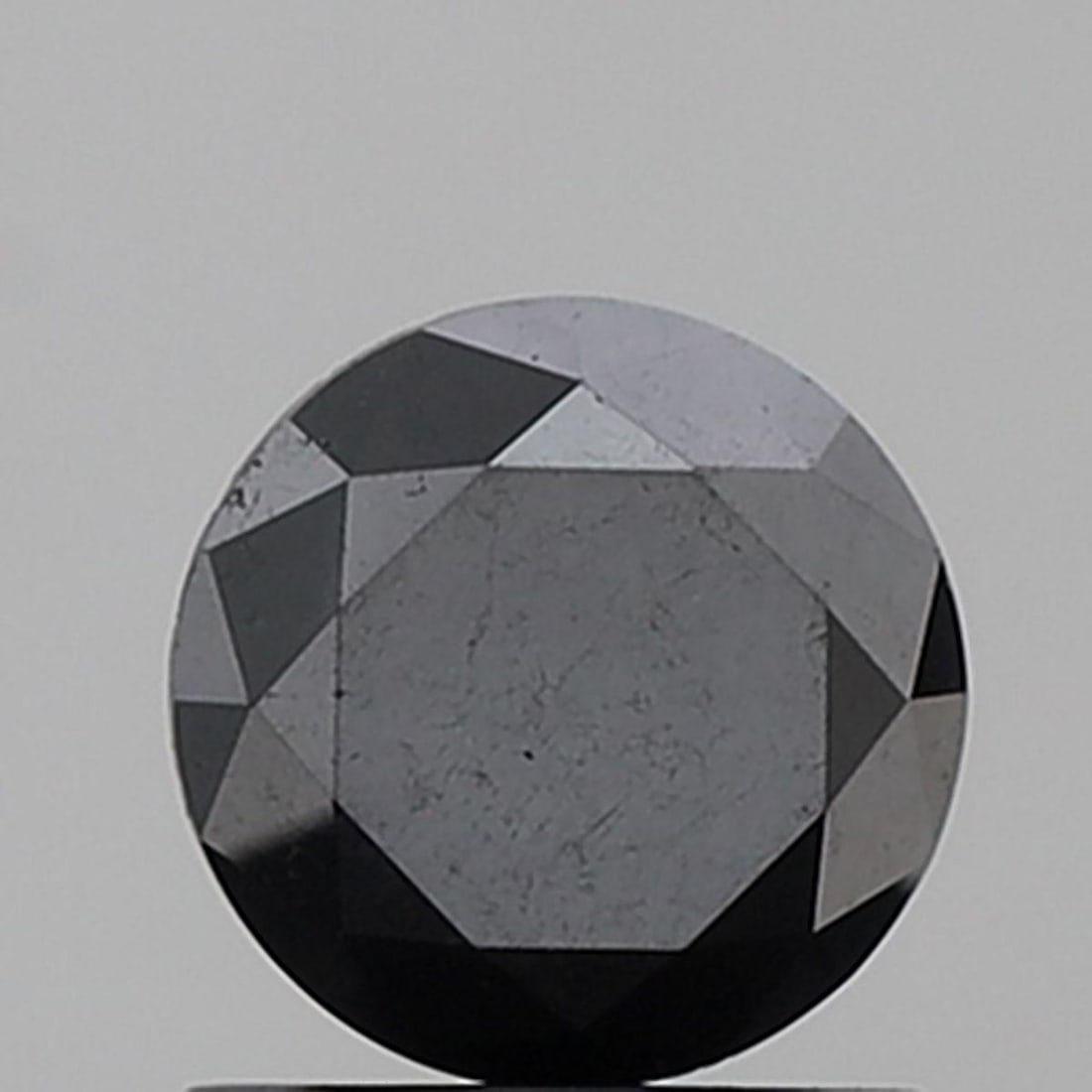 Round 1.17ct Black VVS2 - Loose Natural Diamond: Round 1.17ct Black VVS2 - Loose Natural Diamond Round 1.17ct Black VVS2 - Loose Natural Diamond, featuring exceptional clarity and polish, showcases its lustrous black color in EX condition, with prec
