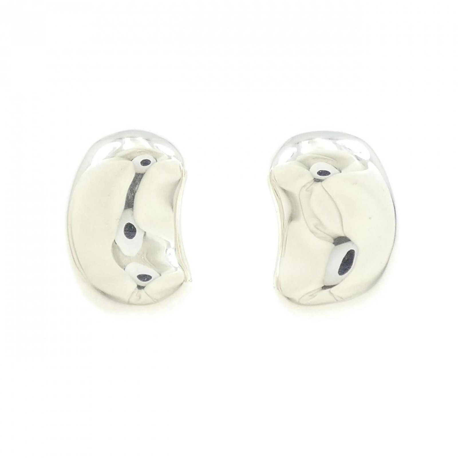 Silver 925 Tiffany Clip Earrings: Silver 925 Tiffany Clip Earrings Silver 925 Tiffany Clip Earrings are crafted from high-quality silver, measuring 21.50mm x 14.60mm in size. The earrings feature a sleek design that clips onto the ear