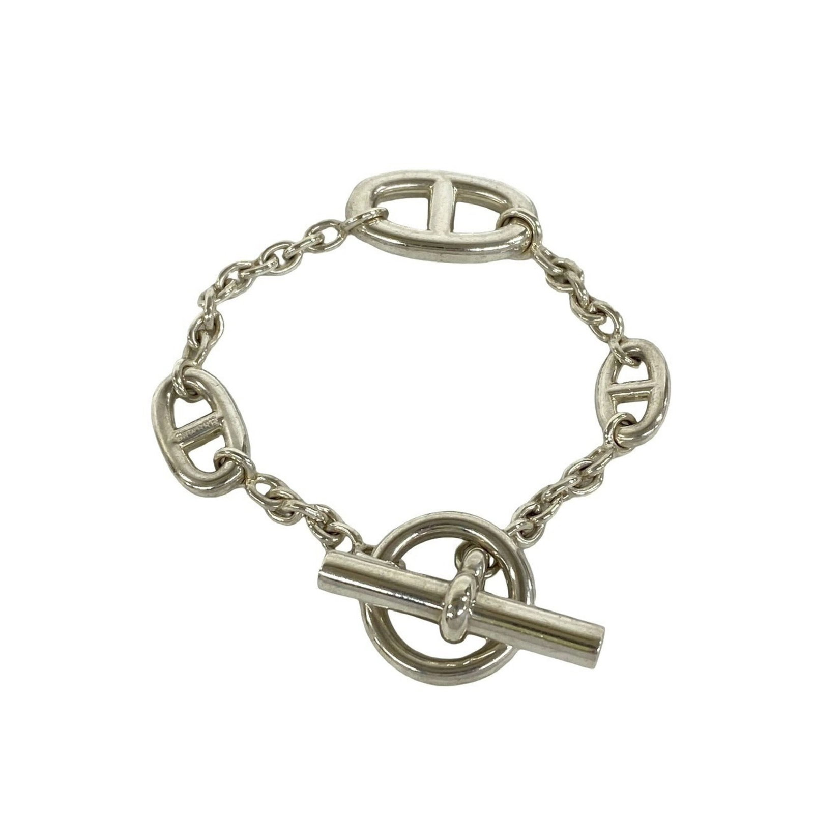 Silver Charm Bracelet Hermes: Silver Charm Bracelet Hermes Silver Charm Bracelet Hermes bears a signature. Made from high-quality silver, this 15cm charm bracelet features a sleek and modern design. Its intricate details make it a
