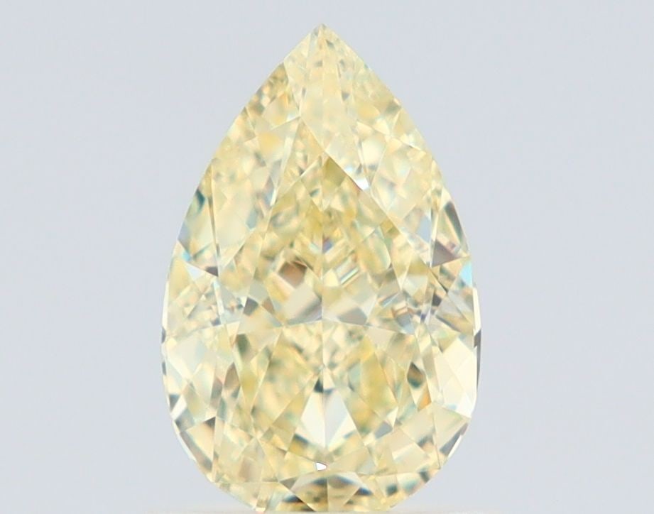 GIA Pear 1.01ct Fancy Light Yellow VVS2 - Loose Natural Diamond: GIA Pear 1.01ct Fancy Light Yellow VVS2 - Loose Natural Diamond GIA-certified, this loose natural diamond boasts a vibrant Fancy Light Yellow color and exceptional clarity, graded VVS2. Its