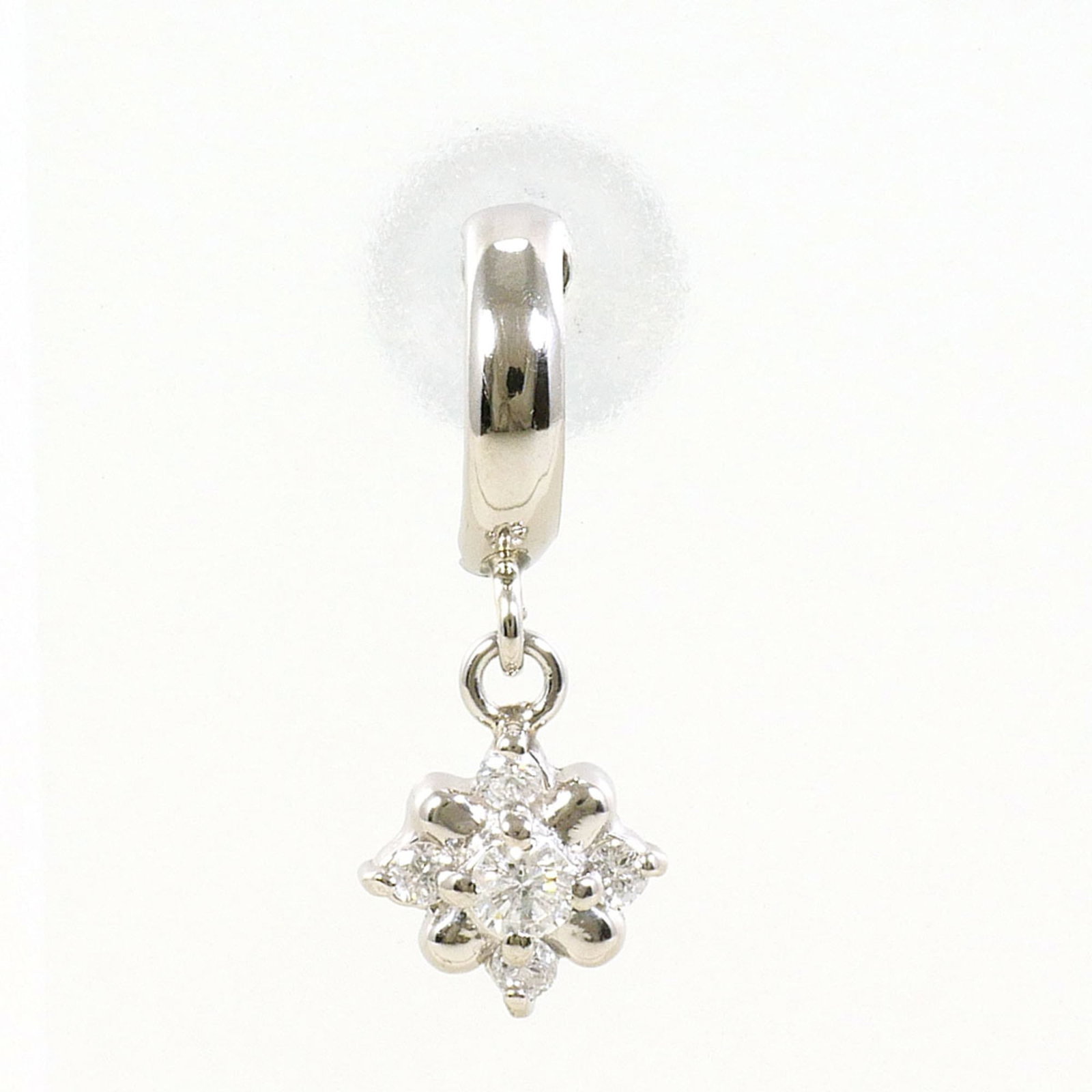 Unbranded Platinum Drop Earrings: Unbranded Platinum Drop Earrings Platinum drop earrings featuring a diamond stone, weighing 0.05 carats and made from platinum metal. The single earring weighs 0.4g / 0.01oz, making it a delicate and 
