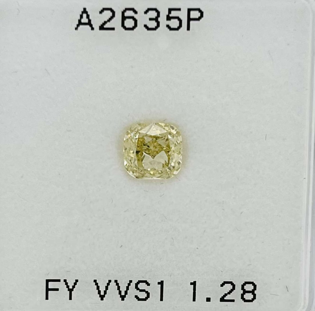 GIA Cushion Brilliant 1.28ct Fancy Yellow VVS1 - Loose Natural Diamond: GIA Cushion Brilliant 1.28ct Fancy Yellow VVS1 - Loose Natural Diamond GIA-certified, this loose natural Fancy Yellow VVS1 diamond boasts exceptional clarity and vibrant color. Measuring 6.04 x 5.79