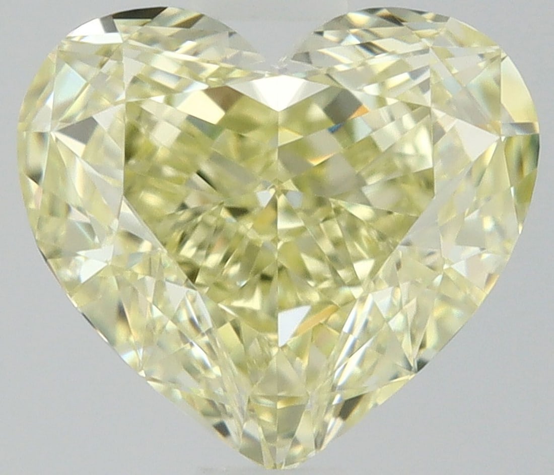 GIA Heart 0.82ct Fancy Light Yellow IF - Loose Natural Diamond: GIA Heart 0.82ct Fancy Light Yellow IF - Loose Natural Diamond GIA certified, this 0.82ct Fancy Light Yellow IF diamond boasts exceptional clarity and polish, with a vibrant light yellow color that sh