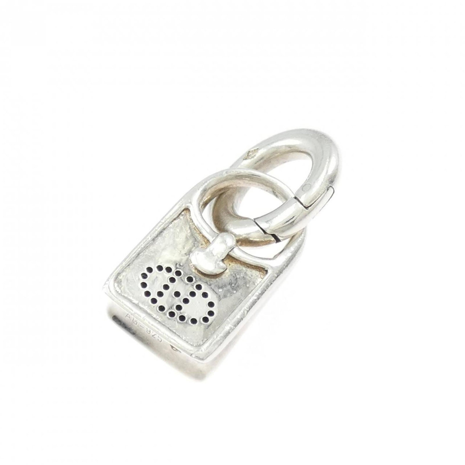 Hermes Evelyne Pendant: Hermes Evelyne Pendant The Hermes Evelyne Pendant is a beautiful silver pendant, made from high-quality 925 material. Its elegant design and sleek silver finish make it a stylish addition to any outfi
