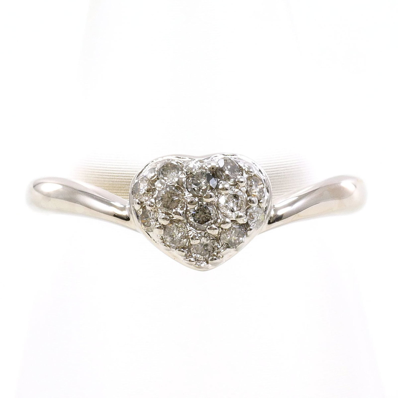 Unbranded Band Ring White Gold (18K): Unbranded Band Ring White Gold (18K) Unbranded band ring in white gold (18K) features a diamond weighing 0.20 carats, set on a 6 US size band with a metal weight of 2.3g / 0.08oz. Made from high-quali