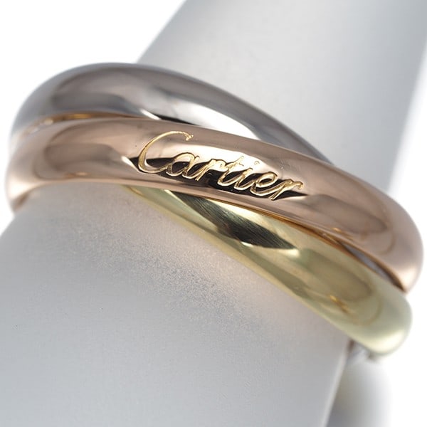 Cartier Ring Trinity 3Color Classic Eu56 18K 750 Yellow White Rose Gold: Cartier Ring Trinity 3Color Classic Eu56 18K 750 Yellow White Rose Gold Cartier Ring Trinity 3Color Classic Eu56 18K 750 Yellow White Rose Gold - A stunning multi-tone gold ring featuring a unique ble