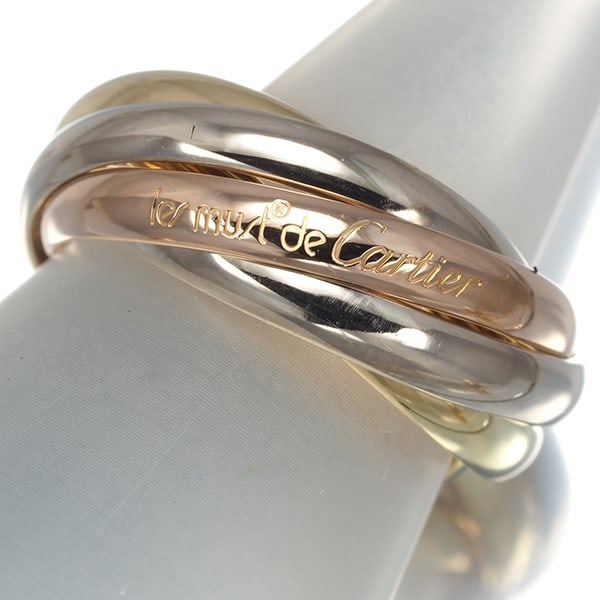 Cartier Ring Trinity 3Color 5-Strand Sm Eu50 18K Yg/ Wg/ Rg: Cartier Ring Trinity 3Color 5-Strand Sm Eu50 18K Yg/ Wg/ Rg Cartier's Trinity Ring boasts a striking multi-tone gold design, featuring three distinct colors in one elegant piece. This 18k yellow, whit