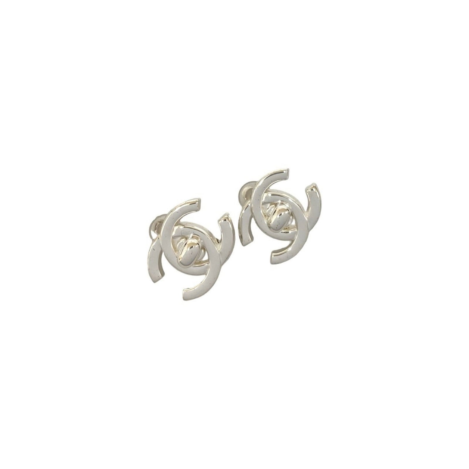 Clip Chanel Earrings Alloy: Clip Chanel Earrings Alloy Clip-on earrings from the iconic Chanel brand, crafted in alloy with a sleek silver finish. Measuring 17mm x 22mm, these elegant drop earrings feature a classic design that 