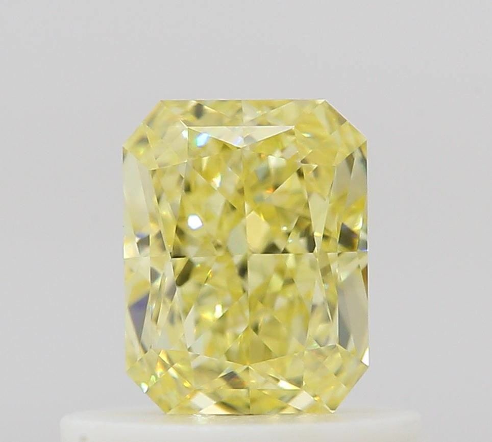 GIA Radiant 0.58ct Fancy Intense Yellow VVS2 - Loose Natural Diamond: GIA Radiant 0.58ct Fancy Intense Yellow VVS2 - Loose Natural Diamond GIA-certified, this loose natural diamond boasts an impressive Fancy Intense Yellow color and exceptional clarity, graded VVS2.