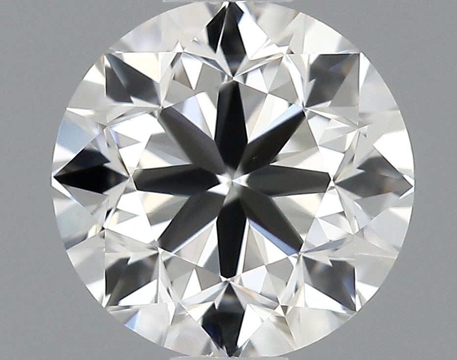 IGI Round 0.71ct E VVS2 - Loose Natural Diamond: IGI Round 0.71ct E VVS2 - Loose Natural Diamond 0.71ct E VVS2 - A Natural Diamond of Exceptional Clarity and Brilliance, Certified by IGI. This loose natural diamond boasts an EX polish, EX symmetry,