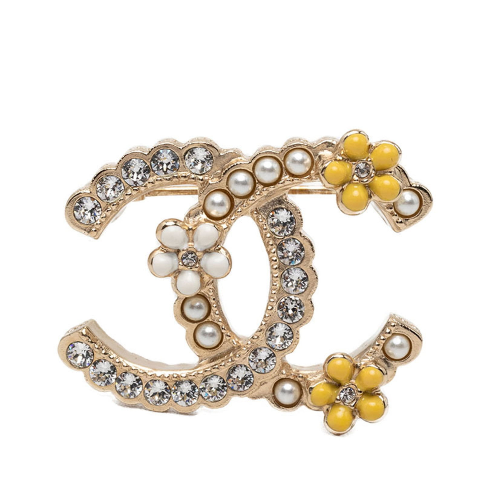 Rhinestone Brooch by Chanel: Rhinestone Brooch by Chanel Rhinestone Brooch by Chanel boasts a striking gold finish and intricate rhinestone design, adding a touch of luxury to any outfit. Measuring 3.54cm x 4.32cm, this elegant