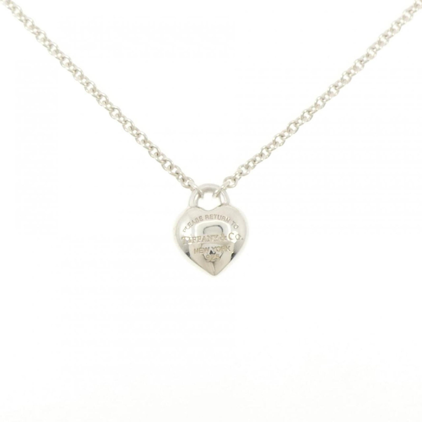 Return necklace to Tiffany: Return necklace to Tiffany Silver Tiffany necklace with pendant featuring a 14.5mm x 11.4mm design, set in a 40 cm / 15.74'' adjustable chain. The necklace bears a signature and is made from high-qual