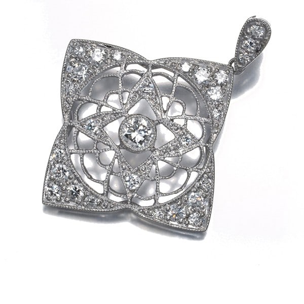 Diamond 0.54Ct Milgrain Openwork Pendant 950 Platinum: Diamond 0.54Ct Milgrain Openwork Pendant 950 Platinum The 0.54ct diamond milgrain openwork pendant in platinum is a stunning piece featuring a natural diamond set in an intricate design. The 950 plati