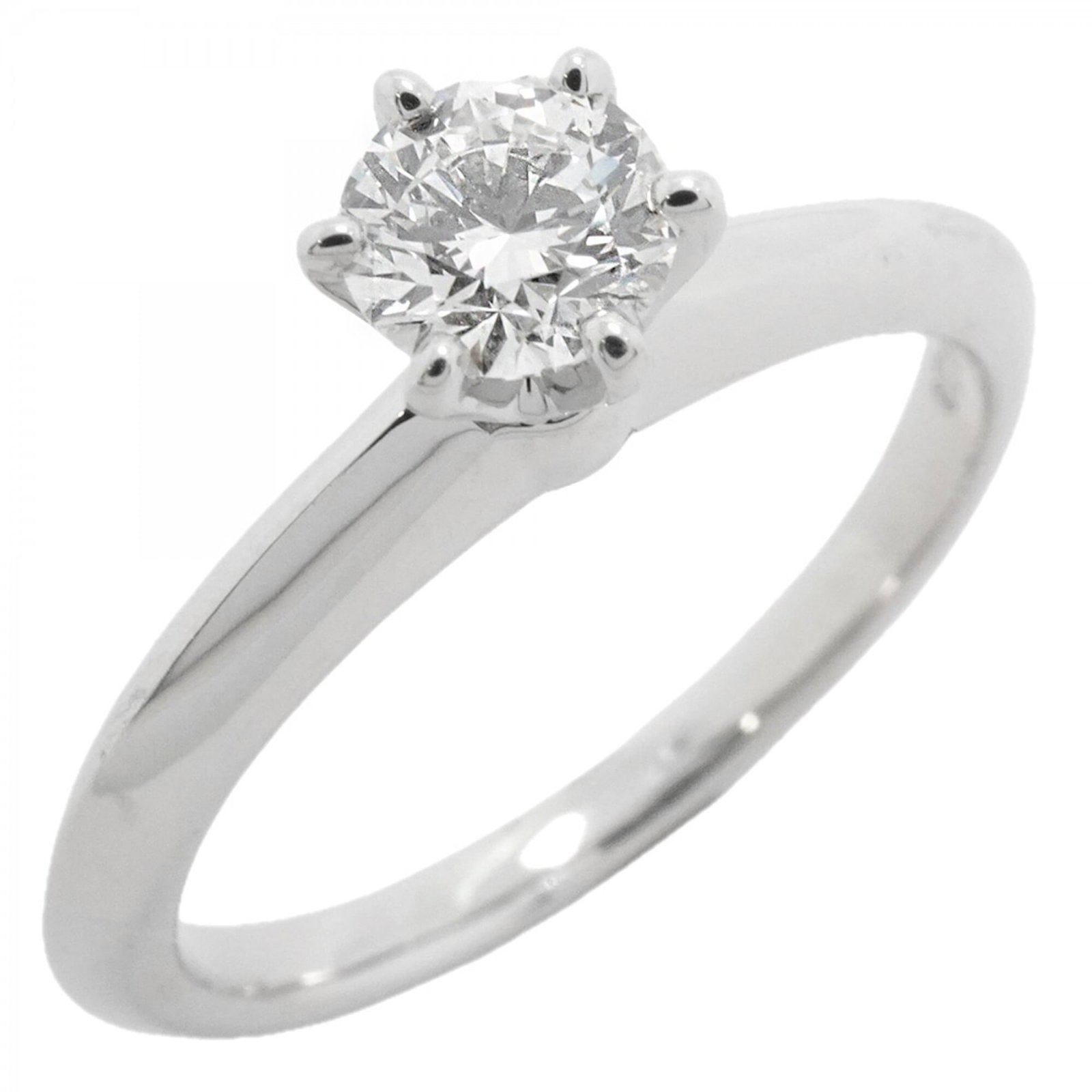 Tiffany Band Ring Platinum 950: Tiffany Band Ring Platinum 950 Platinum band ring from Tiffany featuring a diamond stone, available in US size 4. This platinum 950 band showcases a beautiful diamond setting, crafted with attention