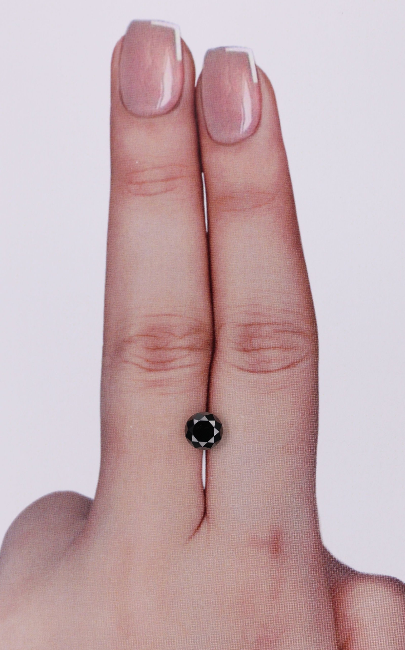 Round 0.75ct Fancy Black VVS2 - Loose Natural Diamond: Round 0.75ct Fancy Black VVS2 - Loose Natural Diamond 0.75ct Fancy Black VVS2 - Loose Natural Diamond, certified with EX cut, color, clarity, and polish, showcasing exceptional symmetry and size in it