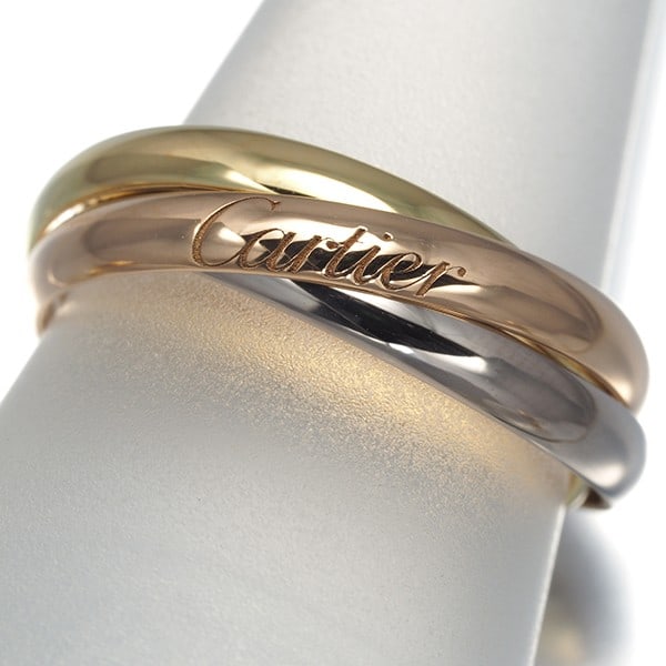 Cartier Ring Trinity 3Color Sm Eu53 18K 750 Yellow White Rose Gold: Cartier Ring Trinity 3Color Sm Eu53 18K 750 Yellow White Rose Gold Cartier's iconic Trinity ring boasts a striking multi-tone design, expertly combining 18k yellow, white, and rose gold in a harmoniou