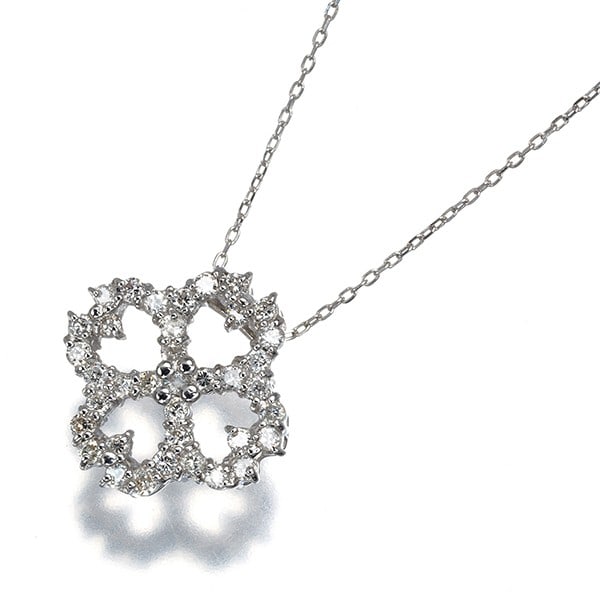 Diamond 0.30Ct Flower Necklace 18K 750 White Gold: Diamond 0.30Ct Flower Necklace 18K 750 White Gold 18k white gold provides a luxurious backdrop for a delicate diamond flower pendant, set in a dainty necklace. The natural diamond, weighing 0.30ct
