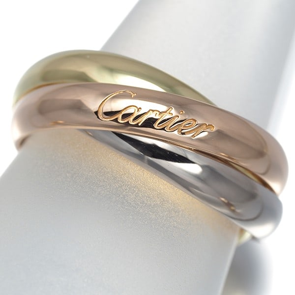 Cartier Ring Trinity 3Color Classic Eu53 18K 750 Yellow White Rose Gold: Cartier Ring Trinity 3Color Classic Eu53 18K 750 Yellow White Rose Gold Cartier's iconic Trinity ring, a masterful blend of three-tone gold, features a sleek design with a subtle rose gold, white