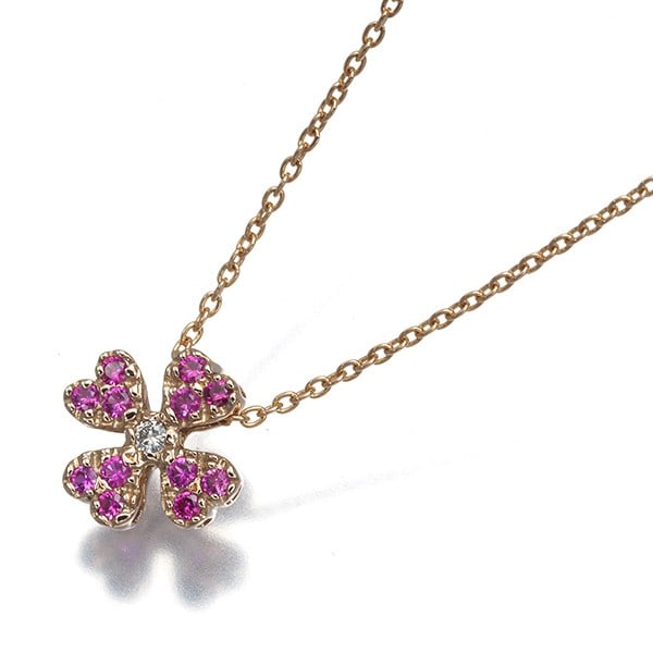 Heart Necklace Flower Milgrain Ruby Diamond 0.02Ct 18K Star: Heart Necklace Flower Milgrain Ruby Diamond 0.02Ct 18K Star Rose gold pendant adorned with a natural ruby and diamond, set in an elegant milgrain design. The 0.02ct diamond adds subtle sparkle to the 
