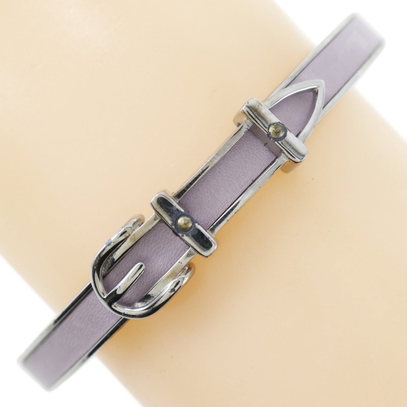 Hermes Bangle: Hermes Bangle Made in France, this Hermes bangle boasts a sleek design with a length of 19cm and a width of 7mm. The item weighs 21.2g and comes in a box for added convenience. Its signature is