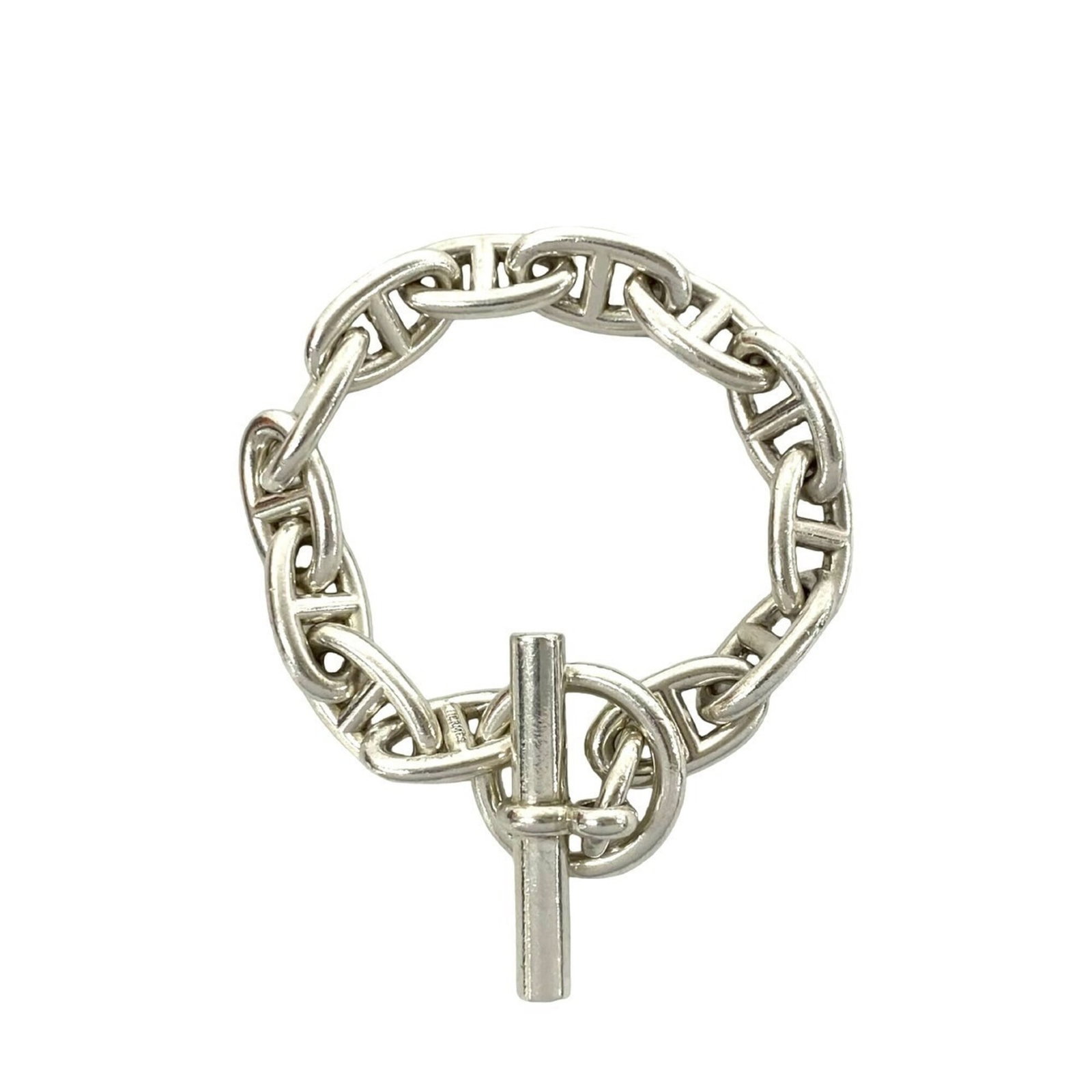 Silver Charm Bracelet Hermes: Silver Charm Bracelet Hermes Silver Charm Bracelet Hermes bears a signature. Made from high-quality silver, this charm bracelet features a distinctive design with various charms. Its sleek 17.5cm leng