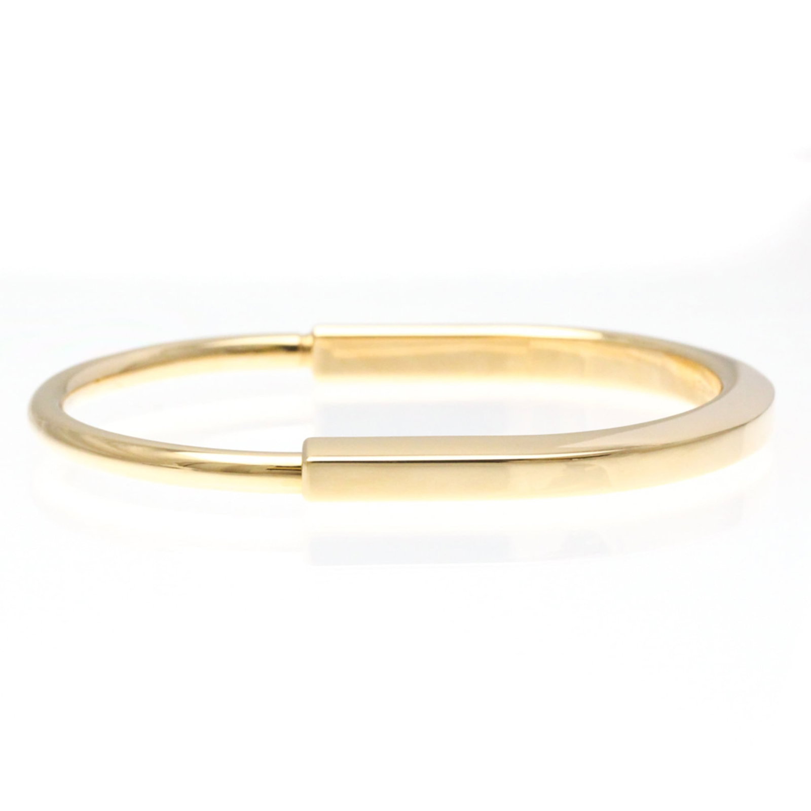 Rose Gold Bangle Tiffany: Rose Gold Bangle Tiffany Rose Gold Bangle Tiffany boasts elegant design with 18K rose gold construction, measuring 18cm in length and featuring a width range of 4mm - 6.1mm. This stylish bangle is pre