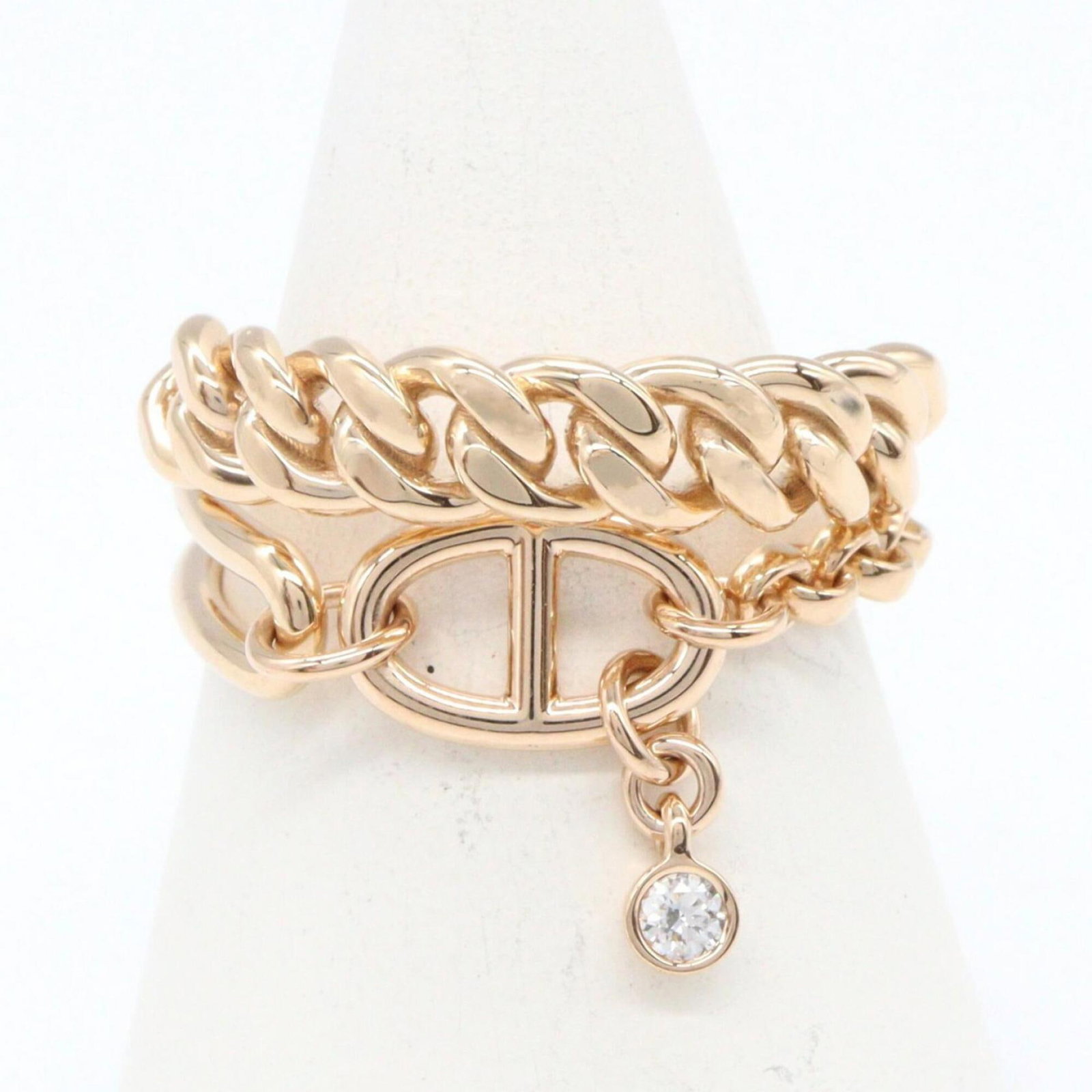 Pink Gold 18K Ring Band Hermes: Pink Gold 18K Ring Band Hermes Pink gold 18K band ring from Hermes, featuring a delicate and elegant design. This US size 8 ring showcases the luxury of pink gold craftsmanship, perfect for adding a t