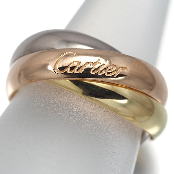 Classic Cartier Eu45 Pinky Ring Trinity 3Color 18Yg/ Wg/ Rg: Classic Cartier Eu45 Pinky Ring Trinity 3Color 18Yg/ Wg/ Rg Classic Cartier Eu45 Pinky Ring Trinity in Multi-Tone Gold. This elegant ring features a unique three-tone design with 18k yellow, white, an