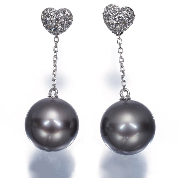 Mikimoto Earrings Black South Sea Pearl Diamond Heart Paved 2Way 18K Wg: Mikimoto Earrings Black South Sea Pearl Diamond Heart Paved 2Way 18K Wg 18k White Gold Mikimoto Earrings Showcase a Lustrous Black South Sea Pearl and Diamond Heart Design. The earrings feature a 10.0