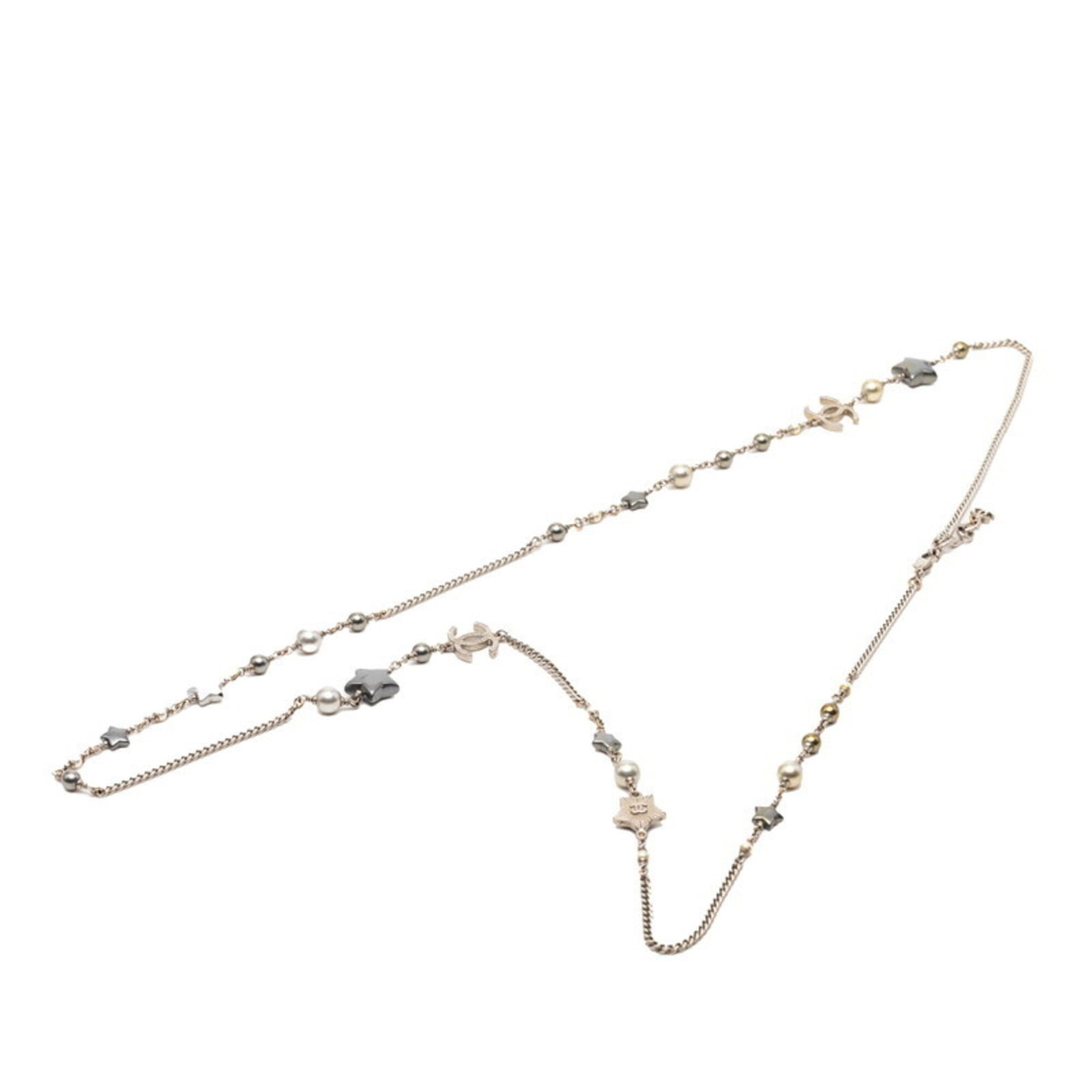 Coco Chanel Women's Long Faux Pearl Necklace Silver Metal Star Mark: Coco Chanel Women's Long Faux Pearl Necklace Silver Metal Star Mark Silver metal star mark adorns this elegant Coco Chanel women's long faux pearl necklace, adding a touch of sophistication to any out