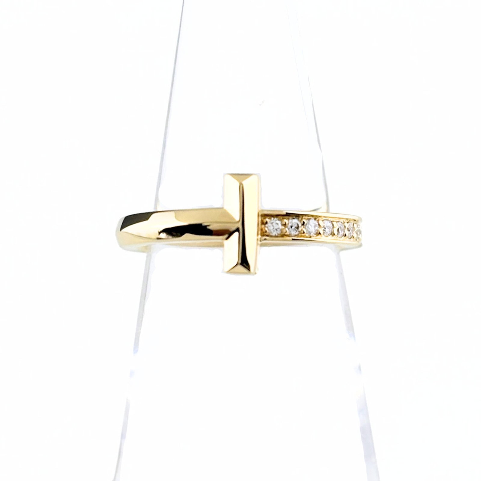 Yellow Gold 18K Tiffany Band Ring: Yellow Gold 18K Tiffany Band Ring Yellow gold (18K) band ring with a classic design, available in US size 4. This 18K yellow gold Tiffany band ring is made from high-quality materials and features a t