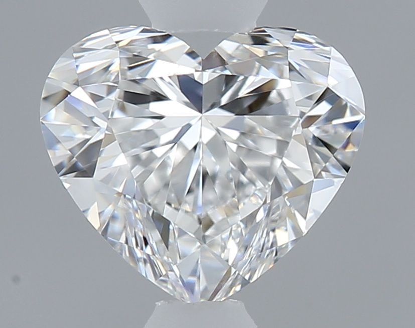 GIA Heart 0.7ct D VVS2 - Loose Natural Diamond: GIA Heart 0.7ct D VVS2 - Loose Natural Diamond GIA certifies this 0.7ct D VVS2 diamond, showcasing exceptional clarity and color. Its EX polish and VG symmetry highlight its natural beauty, making it