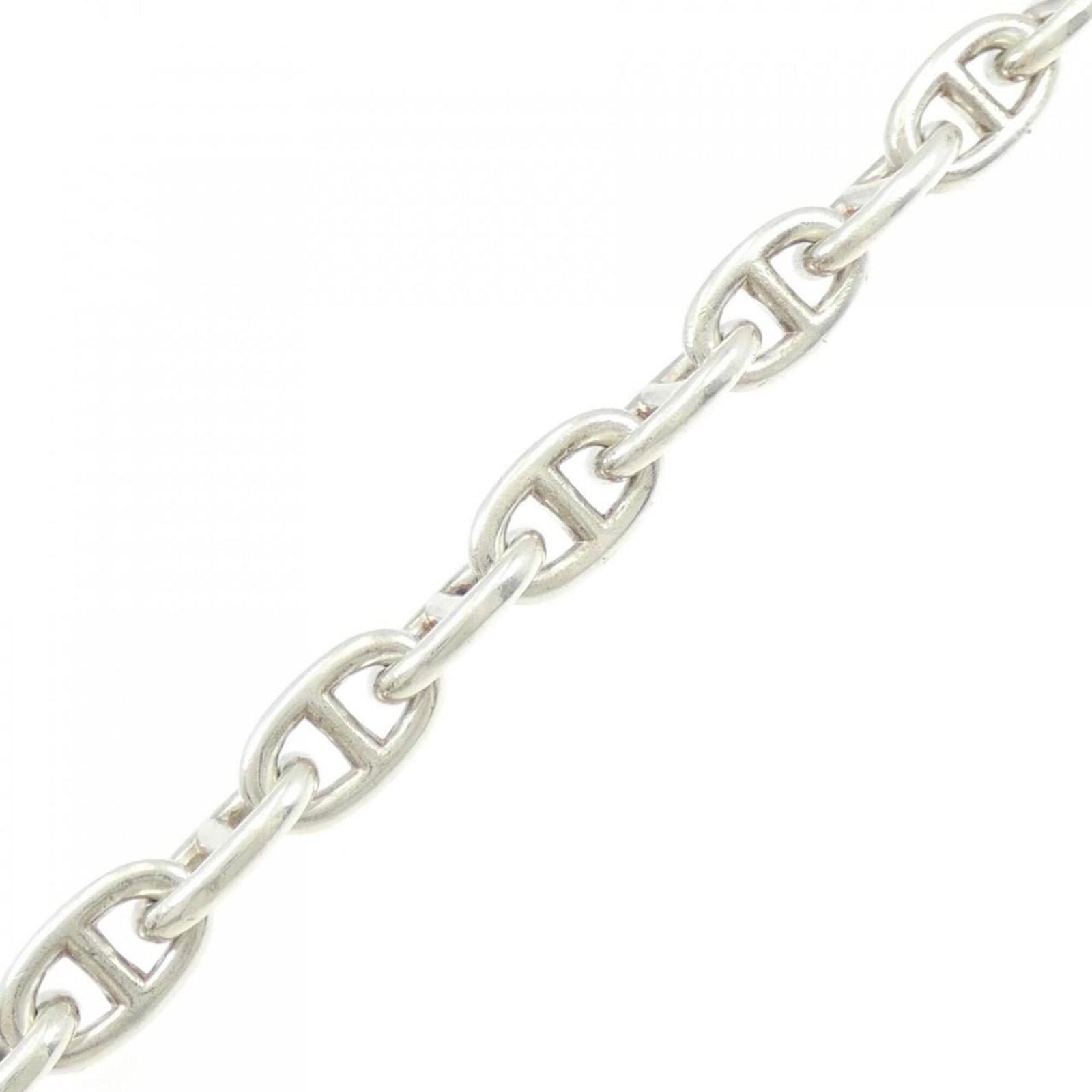 Hermes Charm.: Hermes Charm. Charm bracelet from the iconic Hermes Line, featuring a 9.1mm width and 54.7g weight, with a total length of 23cm. This Chaine d'Ancre charm bracelet boasts a sleek design that showcases