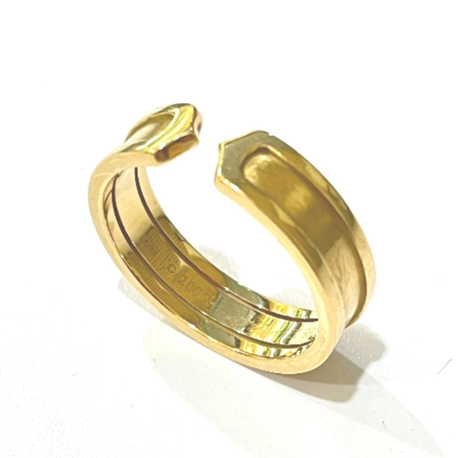 Yellow Gold Cartier 18K Ring: Yellow Gold Cartier 18K Ring Yellow Gold Cartier 18K Ring - A timeless piece from the renowned French luxury brand, featuring a band ring crafted from high-quality yellow gold (18K). This elegant desi