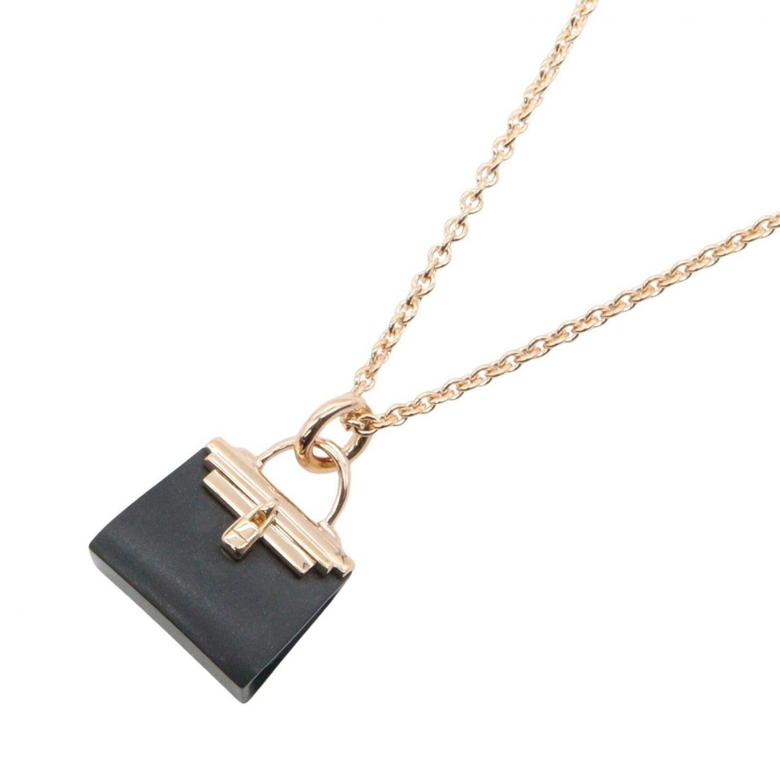 Kelly Black Jade Necklace Women's Gold Tone 18kpg Pink Gold Hermes: Kelly Black Jade Necklace Women's Gold Tone 18kpg Pink Gold Hermes Pink gold (18K) pendant with a black finish, suspended from an 18k pink gold chain. The necklace features the iconic Hermes design an