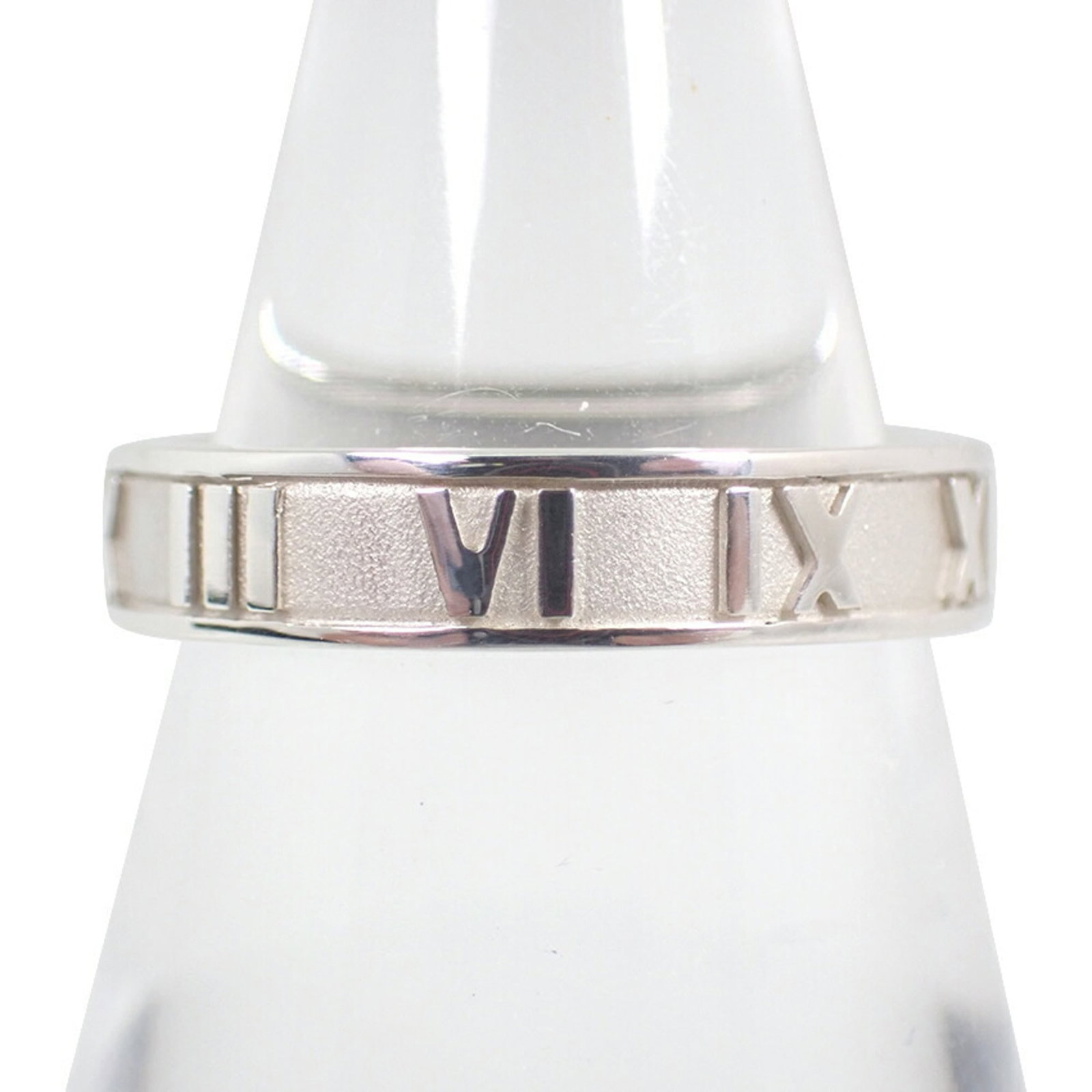 Tiffany Band Ring Sterling Silver 925: Tiffany Band Ring Sterling Silver 925 Sterling silver band ring from Tiffany, available in US size 5.5 and made from 925 material for durability. This classic design features a timeless look that suit
