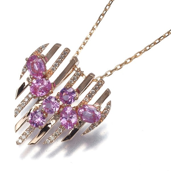 Pink Sapphire Diamond 0.10Ct Heart Necklace 10K 416 Rose Gold: Pink Sapphire Diamond 0.10Ct Heart Necklace 10K 416 Rose Gold 10k Rose Gold Heart Pendant Necklace with Pink Sapphire and Diamond Accents. This beautiful necklace features a natural pink sapphire at i