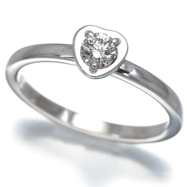 Diamond ring Eu49 platinum heart Cartier: Diamond ring Eu49 platinum heart Cartier Cartier's platinum heart ring features a natural diamond set into a stunning 950 platinum heart design, with a diameter of approximately 3.4mm and a carat weig