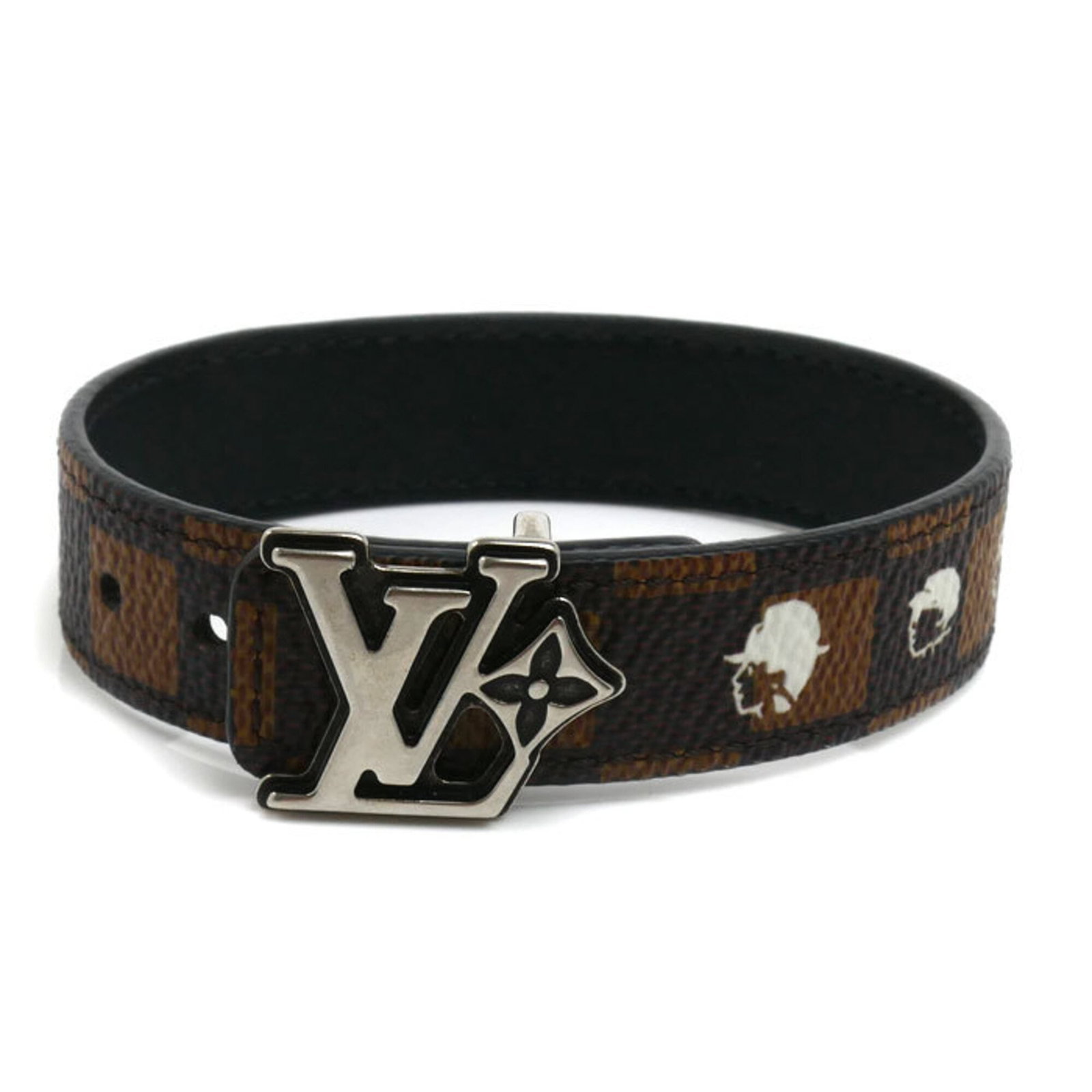 Charm Bracelet Damier Canvas by Louis Vuitton: Charm Bracelet Damier Canvas by Louis Vuitton Damier Canvas by Louis Vuitton, a classic charm bracelet from the iconic French fashion house. This black and brown Damier Canvas charm bracelet features 