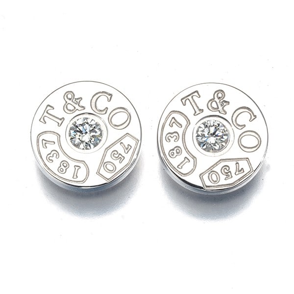 Tiffany&Co. Earrings Diamond 1837 Circle 18K 750 White Gold: Tiffany&Co. Earrings Diamond 1837 Circle 18K 750 White Gold Tiffany & Co.'s iconic 1837 Circle collection shines in these elegant stud earrings, crafted from 18k white gold. A natural diamond adorns t