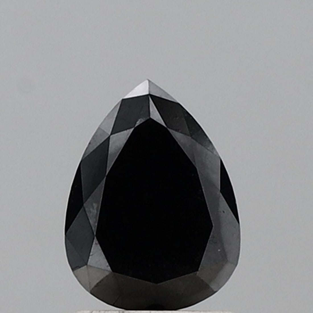 GIA Pear 2.04ct Fancy Black VVS1 - Loose Natural Diamond: GIA Pear 2.04ct Fancy Black VVS1 - Loose Natural Diamond GIA-certified Fancy Black diamond, measuring 2.04 carats in loose natural form, boasts exceptional clarity (VVS1) and polish (EX), with a symme