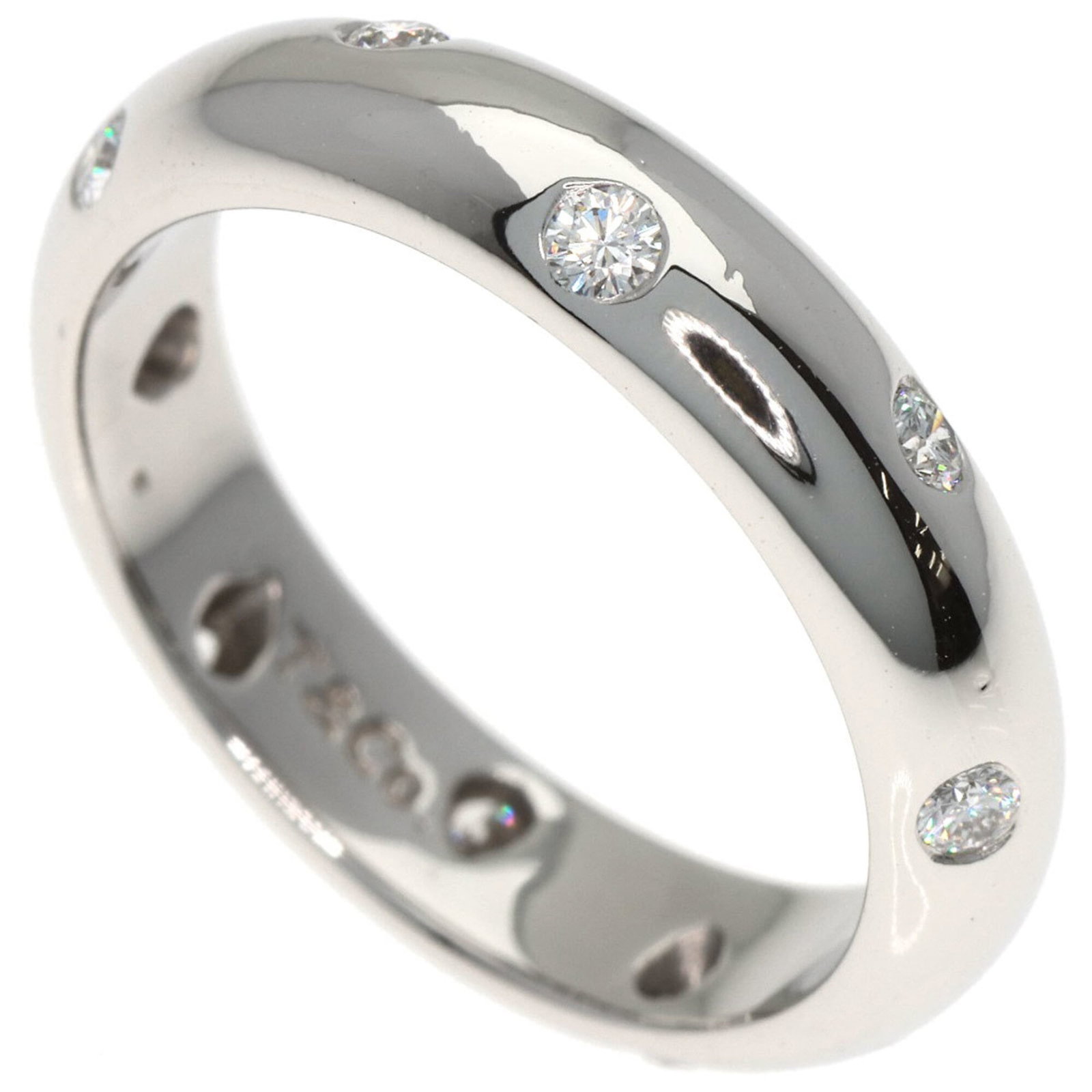 Tiffany Band Ring Platinum 950: Tiffany Band Ring Platinum 950 Platinum 950 Tiffany band ring in silver, available in US size 5.5. This elegant ring features a striking design that showcases the luxury of platinum, a rare and valuab