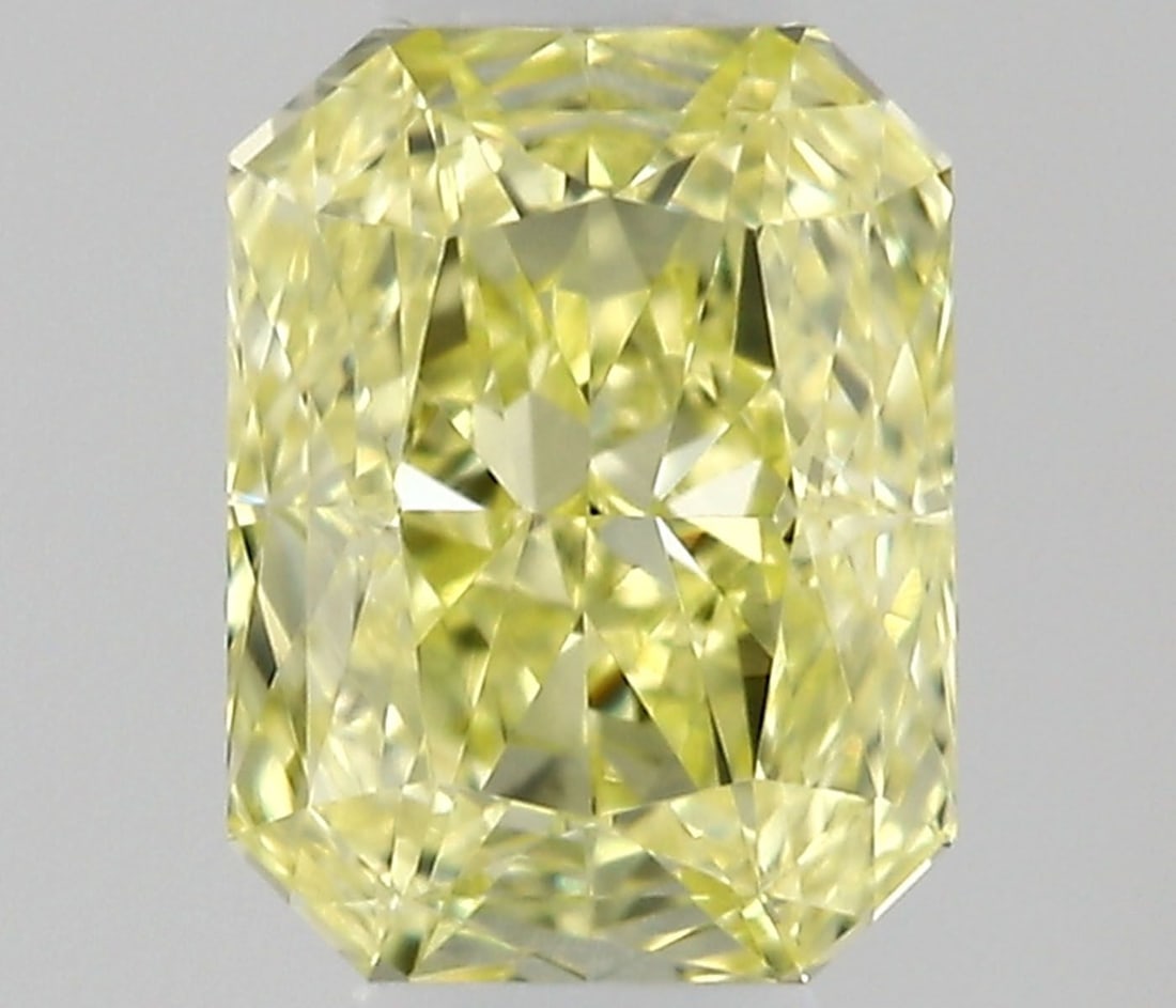 Radiant 0.28ct Fancy Yellow VVS1 - Loose Natural Diamond: Radiant 0.28ct Fancy Yellow VVS1 - Loose Natural Diamond 0.28ct Fancy Yellow VVS1 - Loose Natural Diamond, boasting EX polish and VG symmetry, showcases its radiant beauty with exceptional clarity