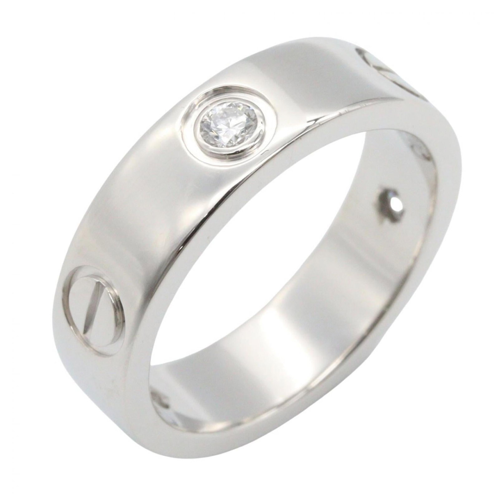 Cartier Band Ring White Gold (18K): Cartier Band Ring White Gold (18K) Cartier Band Ring White Gold (18K) features a clear, silver stone set in 18K white gold. This elegant band ring boasts the renowned Cartier brand and US size 6.5. Th