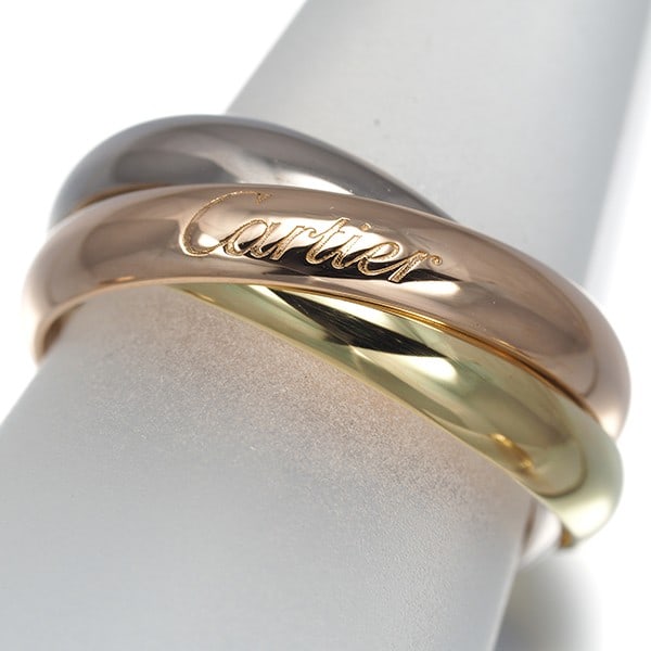 Yellow White Rose Gold Classic 3Color 18k 750 Cartier Eu54 Ring: Yellow White Rose Gold Classic 3Color 18k 750 Cartier Eu54 Ring Cartier's iconic Eu54 Trinity Ring boasts a striking three-tone design, expertly combining yellow gold, white gold, and rose gold in a