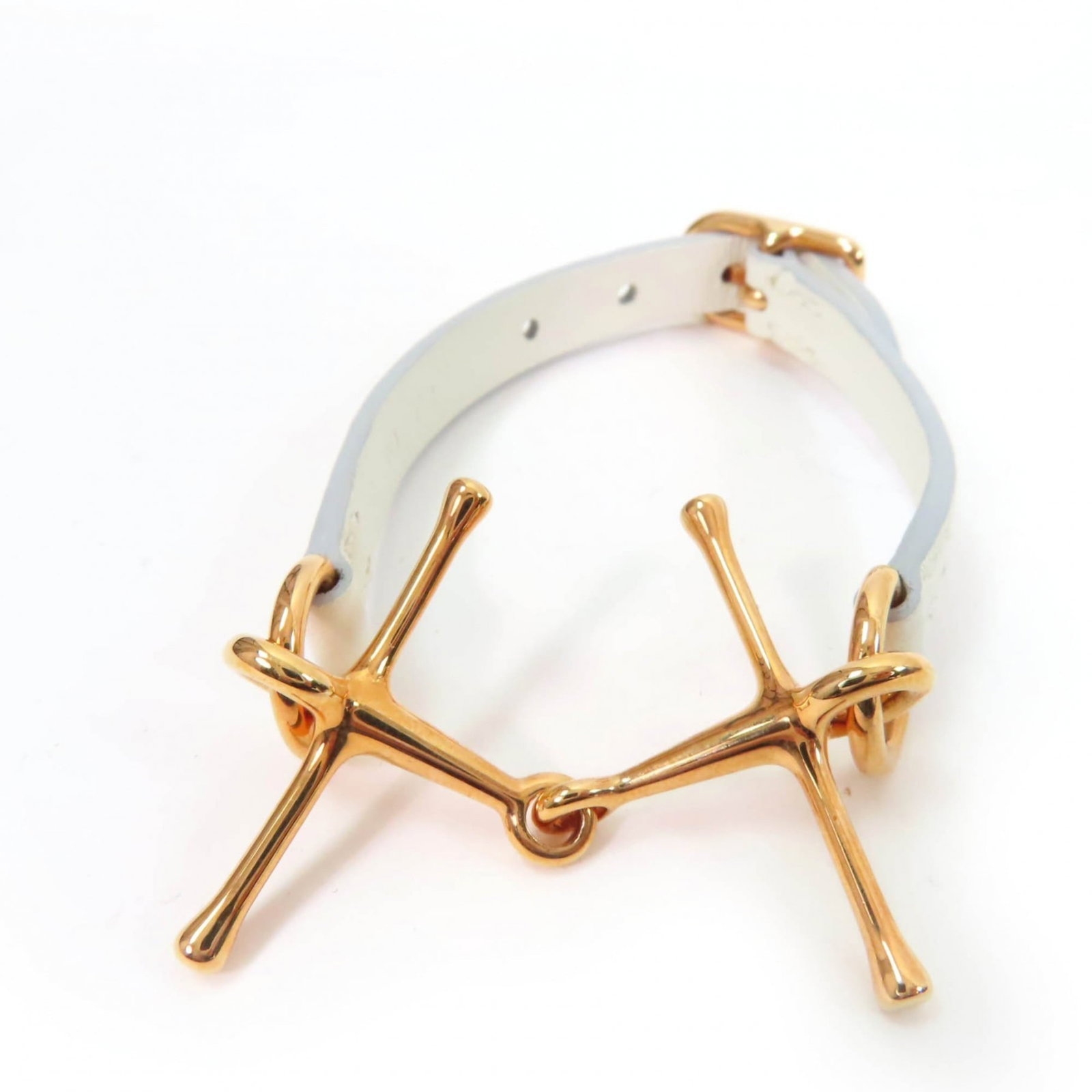 Hermes Charm.: Hermes Charm. Pink gold and white charm bracelet from Hermes, available in sizes T2. This 15cm-17cm long piece comes with its original box and dust bag for added convenience. A stylish accessory for w