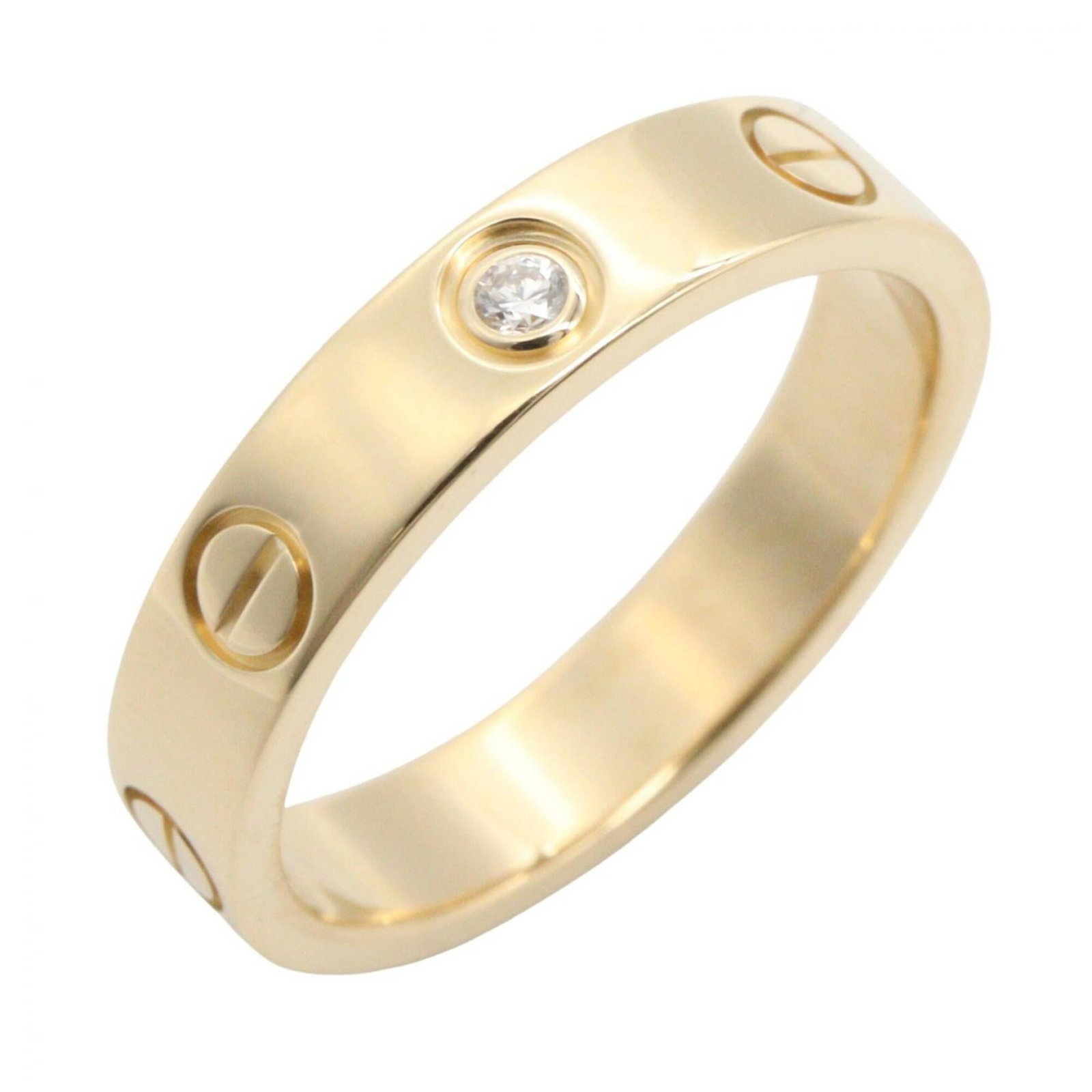 Yellow Gold Cartier 18K Ring: Yellow Gold Cartier 18K Ring Yellow gold Cartier ring with clear diamond and 18K yellow gold material, available in US size 5. This band ring features a notable design from the renowned luxury brand C