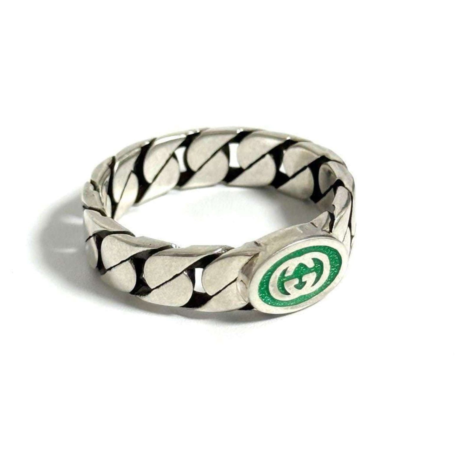 Gucci Band Ring Silver 925: Gucci Band Ring Silver 925 Silver 925 band ring from Gucci, featuring the iconic brand's signature style. This men's accessory comes in US size 10 and includes a box and dust bag for added convenience